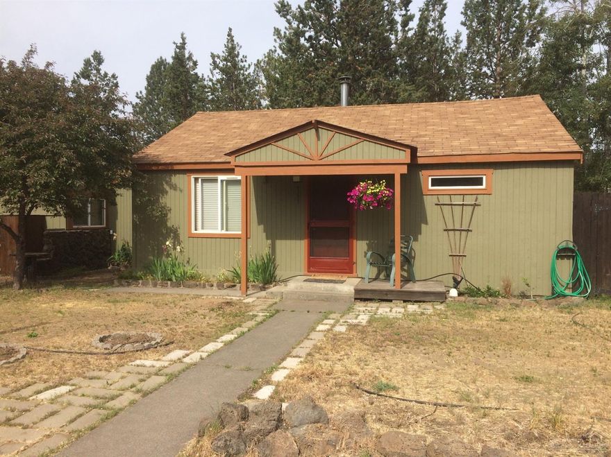 Northwest Bend Charm on Larger Lot. Could be a VACATION RENTAL - per City Planning. Purchaser to verify. Walk to downtown and Drake Park. Near First Street Rapids and the Deschutes River Trail. . 20 x 20 heated workshop with built-ins. Raised garden beds, drip system. Big yard with mature trees, pond, deck and covered patio. Fenced with RV storage area. Lots of wildlife. Artist renovated spacious 2 bedroom. 1243 square feet.