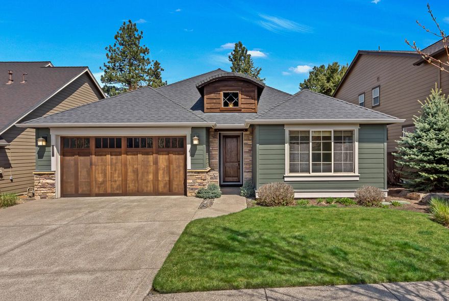 Beautifully maintained single level Pahlisch home is located in The Bridges of Shadow Glen.  Entering through a covered porch, your eyes are drawn to a wall of windows upon your first steps inside. Decorative stone archway brings you into a vaulted Great Room with skylights providing more natural light.  A Stone surround fireplace with hearth and engineered wood flooring, tying it all together.  3 Bedrooms are separated with privacy hall to primary.  Vaulted primary bedroom has door onto patio, coffered and lit ceiling. Primary bath with soaking tub, glass surround shower, larger walk-in closet. Light and bright Junior suite off entry with full bath. All Appliances remain in the home. Custom blinds throughout.   Double garage is insulated,  The Large covered patio, is set to provide you privacy, and nature's views.  Enjoy the amenities of The Bridges, the location, the Life in Central Oregon.