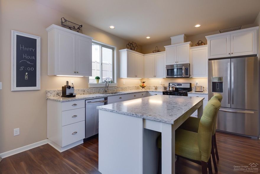 Beautiful, bright, award winning Samson townhome in McCall Landing is less than a block to Boyd Park. Almost new Pahlisch townhome features 3 beds, 2.5 baths, a large vaulted loft with skylights, and a cute built-in desk off the open kitchen. This home has upgraded quartz counters, white cabinets, extended concrete patio, front screen door and more. Home is only attached at the garage, powder bath and kitchen wall - no bedrooms or living spaces are attached! Home has some mountain views from the upstairs.