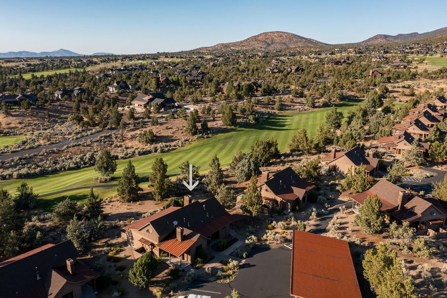 Discover Ranch Cabin 53, a spacious 1,711 square foot, three-bedroom, three-and-a-half-bath cabin in the prestigious Brasada Ranch resort community. This cabin offers a practical layout with vaulted ceilings, hardwood floors, and two stone fireplaces, creating a cozy yet elegant atmosphere. Many resort amenities, including the athletic center, are close by. The kitchen features granite countertops and stainless steel appliances, ideal for cooking and entertaining. Each bedroom has a private bathroom outfitted with high-quality finishes. A rare additional half bath adds convenience for guests. Outside, the large deck includes a private hot tub and space for a BBQ, perfect for enjoying the outdoors. Residents and guests have access to Brasada Ranch's extensive amenities, including multiple pools, an equestrian center, an 18-hole golf course, and hiking and biking trails. Additional facilities include a spa, restaurants, and a fitness center.