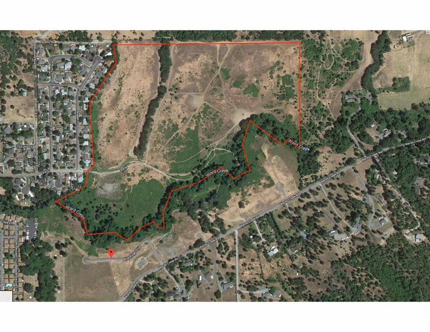 Here is a great opportunity to develop this prime 66.5-acre parcel of spectacularly scenic, gently rolling land into a medium-sized subdivision in Rogue River, Oregon. The city's planning commission and city council have tentatively approved annexation and a subdivision of 170+ spacious single-family residential lots of 8,000 to 16,000 sq ft each. Or tentative county approval for 24 lots of approx. 2.5 acres each. All services including gas and possible irrigation are available at the property boundaries. Buyer to perform all research and due diligence regarding development and associated requirements and costs (including but not limited to annexation, zoning, access, required improvements, availability of utilities, etc.