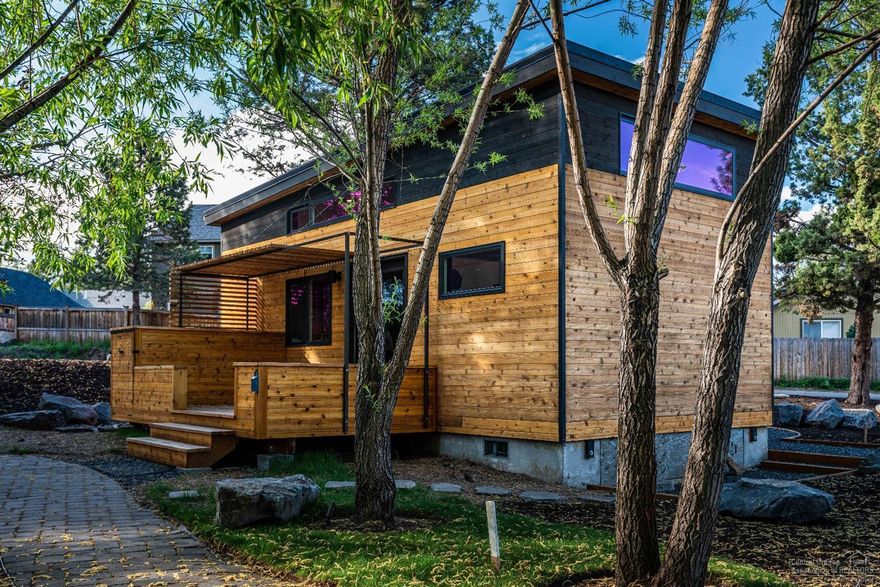 Welcome to The Hiatus, a one-of-kind cottage-style community. 22 private lots with modern 598 sf cottages. Simple and functional with the highest-quality fixtures and surfaces keeping livability in mind and affordability by design. Located in a parklike setting with a network of paver pathways, ponds, gardens, mature ponderosas, and cozy fire pits. Your indoor/outdoor sanctuary awaits!