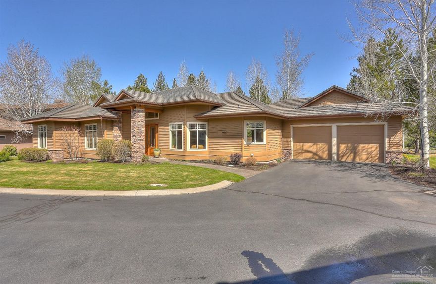 One of the few single level townhomes in Broken Top! This unique stand alone home boasts a bright great room with floor to ceiling windows, gourmet kitchen with slab granite and vaulted ceilings that lead out to a private patio with fenced back yard. It features a master and guest ensuite with radiant floor heating. The large office could easily serve as a third bedroom. Large two car attached garage provides additional storage to hold all of your outdoor gear. HOA takes care of exterior maintenance