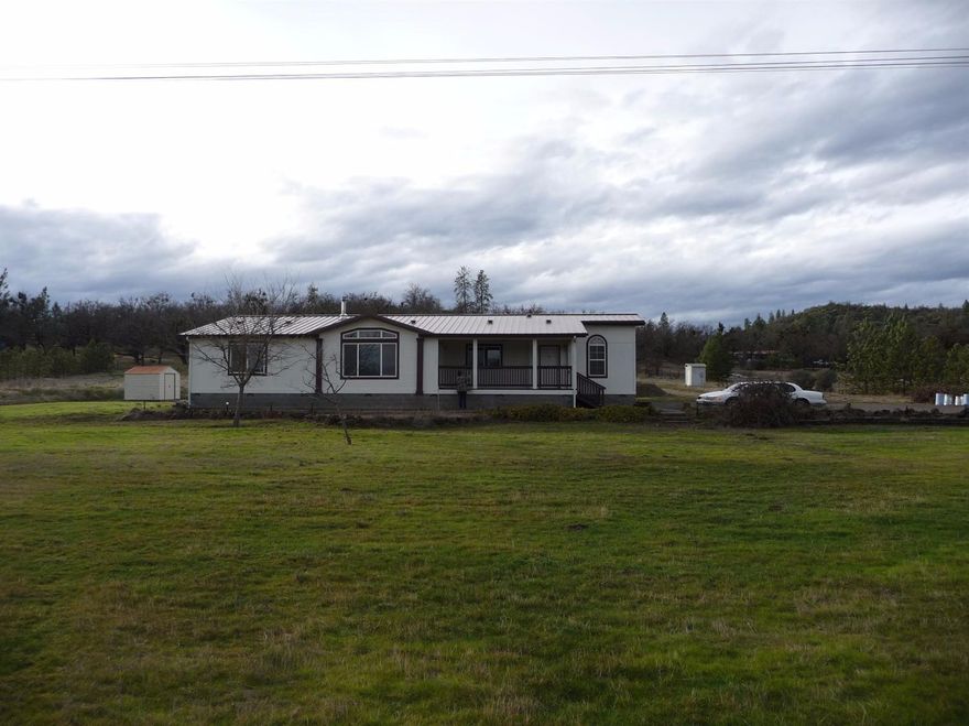 Extraordinary rural property with just over 5 acres features tons of extras you wont miss out on. Spacious newer triple wide with 2510 sq ft shows extremely well and is move in condition! Great use of the floor plan offers both living-family room areas with vaulted ceilings. Impressive kitchen includes tons of cabinet space with large center island, corian counter tops, and all appliances to stay. Enjoy Mt McLoughlin and surrounding views right from your front porch. Huge detached 40 X 40 shop with finished hobby room and full bath w/shower. Plus 18 X 40 fully insulated covered RV carport with roll up doors. Conveniently located just one block away to the Rogue River and Dodge Bridge boat ramp. Excellent opportunity here to finally experience the complete package!