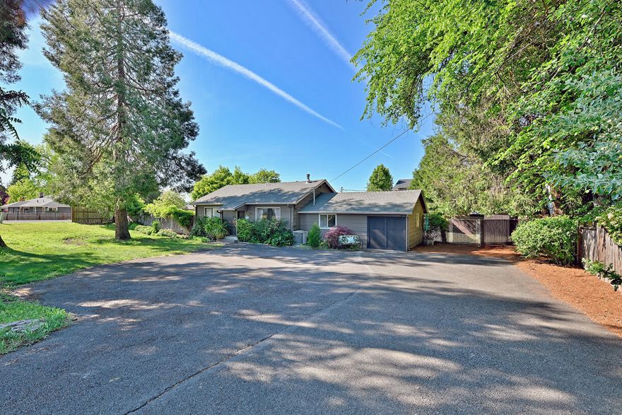 Discover endless potential within this spacious home on a large corner lot of .33 acre minutes from town. This spacious property offers RV parking, room to add a pool, garden, and much more. Your vision can come to life here to make your perfect outdoor oasis. Inside enjoy a large layout of 2032 sq ft, with 4 bedrooms and 2 bathrooms perfect for the growing family, first time home buyers, investors or persons looking for a great space to make their own. With a little bit of work this home could have a lot of equity. Schedule soon and do not miss your opportunity to own this large lot in Central Point, Oregon. Seller willing to contribute $1000 towards a home warranty with a suitable offer.