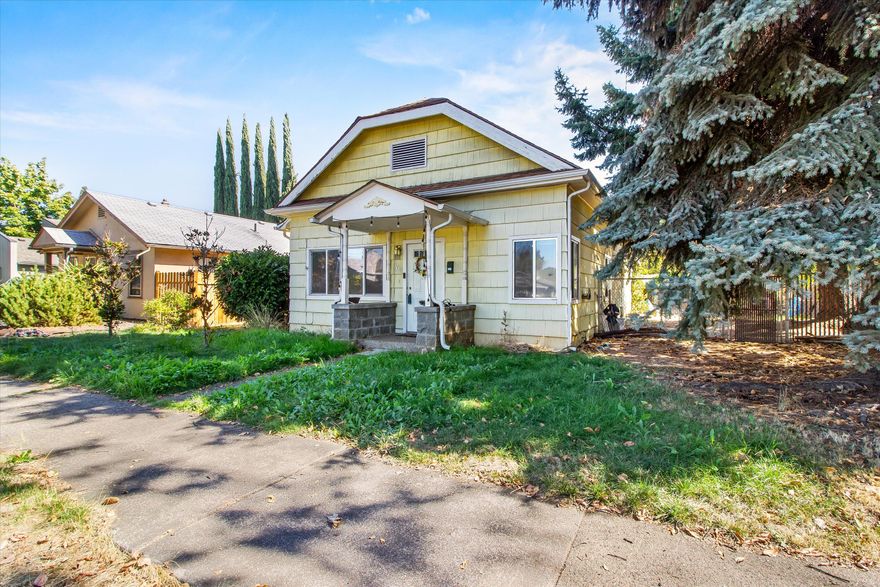 Perfect starter home! This classic 1910 home in Medford is cute and low maintenance! Featuring 2 bedrooms and 1.5 bathrooms and over 1200 sqft of living space. The home also has a small shop in the backyard with alley access and a large yard perfect for animals or entertaining friends and family. Located in a mature Medford neighborhood. The kitchen has been updated with lots of natural light and the home offers plenty of storage and space. Don't miss out on this home, make an appointment and tour it today!