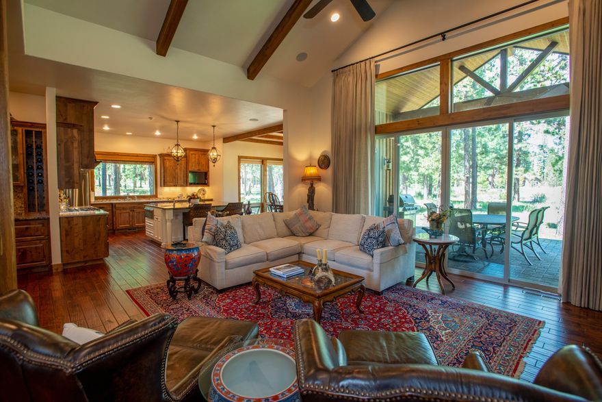 A Prestigious location with breathtaking views of Fireglass Lake and stream. Nestled in the pines this spacious open floor plan has extraordinary attention to
detail throughout that will exceed you expectations. This luxurious home features a beautiful vaulted entry, beam work and gorgeous use of a natural stone
fireplace, an entertainers gourmet kitchen and impressive great room that opens up onto an expansive patio. abundant windows, main floor master suite with a
fabulous bath, 2nd en suite bedroom, Upstairs living space opens to a wonderful balcony overlooking the Pond.