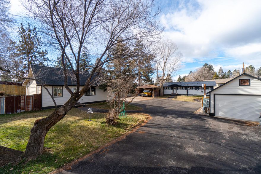 Affordable housing in the heart of Bend. Turn key rental property w/upside potential or develop into high density. Two single family homes on one lot, plus 24x36 garage/shop & additional carport. Turn key homes & plenty of space for additional dwellings. Unit A has just been fully remodeled and is available for showings. Lots can be split or each home could add an ADU, lots of opportunity for adding investment potential. This property is eligible for high density! Both homes connected to city water & sewer with own power meters. One 3 bedroom, one 2 bedroom, both w/& 1 full bath, tiled showers, wood/wood look floors, refrigerators, ranges, washers, dryers & wood burning fireplaces. New exterior paint & roofs also replaced in 2019. Raised garden beds, fenced yards, plenty of parking & storage. City of Bend is excited to partner in increasing density! *** Please do not disturb tenants in rear unit***
