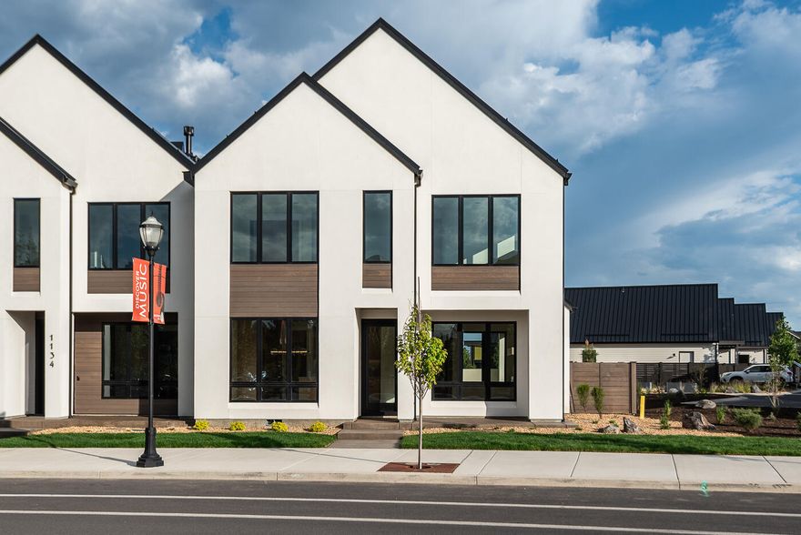 Scandinavian-inspired modern design with the award-winning craftsmanship of Structure Development NW in Discovery West. Trove Townhomes blend clean lines, contemporary finishes, and an open-concept layout, offering extraordinary living spaces. Great room with gas fireplace, custom built-ins and hardwood floors. Kitchen features professional appliances, large island and pantry. Dining area and covered patio are perfect for entertaining. The upper floor is highlighted by a stunning primary suite with vaulted ceilings, tile shower, radiant floors and a large walk-in closet. Two additional bedrooms, full bath, loft, laundry room and covered deck complete the upper floor. Garage offers ample storage, and the fully landscaped yard enhances the home's curb appeal. Located across from Discovery Corner Plaza, a vibrant hub for shopping, dining, and neighborhood events. Embrace a carefree, active lifestyle in the heart of Discovery West on the westside of Bend.