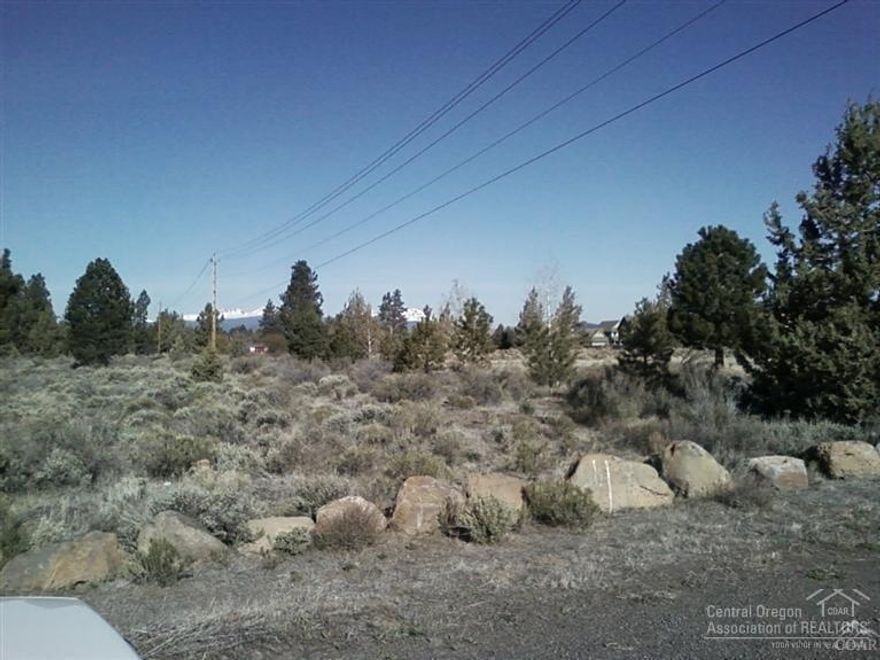 Property consists of 3.27 acres situated inside the Bend Urban Growth Boundary. This parcel benefits from the availability of Avion Water with a septic system on site. parcel located neat schools, Eastside shopping, medical facilities, restaurants and provides access to the Downtown and The Old Mill district via Reed Market Rd. Located on the canal with mountain views.