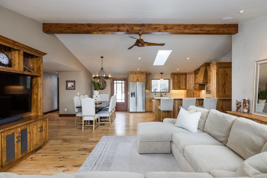 This gorgeous single level home was extensively remodeled down to the studs in 2017 by Black Rock Construction and exudes quality in every aspect of construction. The great room lives large with wood wrapped picture windows to showcase amazing sunsets and cascade mountain views. The master suite has nice separation from the other bedrooms with a large walk-in closet, vaulted wood ceilings, full tile steam shower, and radiant floor heat. There is an additional jr. suite on the other end and the 4th bedroom is set up as an office with a custom built in desk. The oversized 3 car garage is 1098 SF with hand troweled texture, paint, wood wrapped windows, and built-in cabinets. There is also a new 12' X 16' shed for additional storage. The 2.5-acre lot provides privacy and elbow room through low maintenance natural desert landscape with a lovely back yard of grass, mature trees, perennials, and custom water feature to be enjoyed off the covered back patio & gourmet outdoor kitchen.