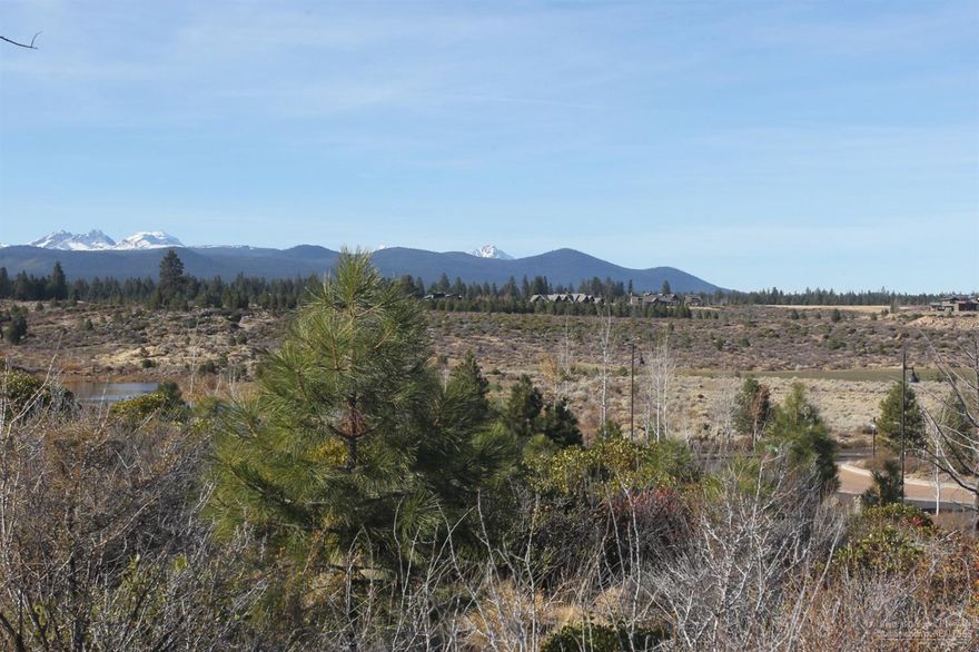 Uniquely positioned on a prow of land in Tetherow's Heath neighborhood, this homesite offers Cascade Mountain and northern views in a gated and quiet cul-de-sac. Falling topography encourages a walk-out design with decks for entertaining. Golf membership included as part of sale but Buyer can elect to be social member only if desired. Some of these photos are representative of overall Tetherow community.