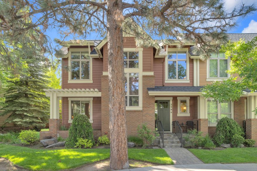 This luxury Earth Advantage townhome in Northwest Crossing is in the heart of Bend's west side. Walk to Compass Park, the Farmer's Market, NWX shops, restaurants, and the Grove. This light-filled end unit features an open plan with vaulted ceilings. A gracious foyer with a half bath opens into a great room flooded with natural light from 3 skylights and views into 2 private patios. One patio, with a taller wall for privacy, is a wonderful setting for dining, and the other borders a small lawn and garden. The main floor primary suite has a large walk-in closet and a well-appointed bath. Upstairs are 2 bedrooms - or office or den  - with extra large walk-in closets and a second full bath. The kitchen has a quartz island for casual dining, a coffee bar & walk-in pantry. Special features include a central vacuum system, whole house ventilation, and a new roof. The HOA fee covers landscaping, snow removal, and exterior maintenance. Live your best life in Bend in this low maintenance home!