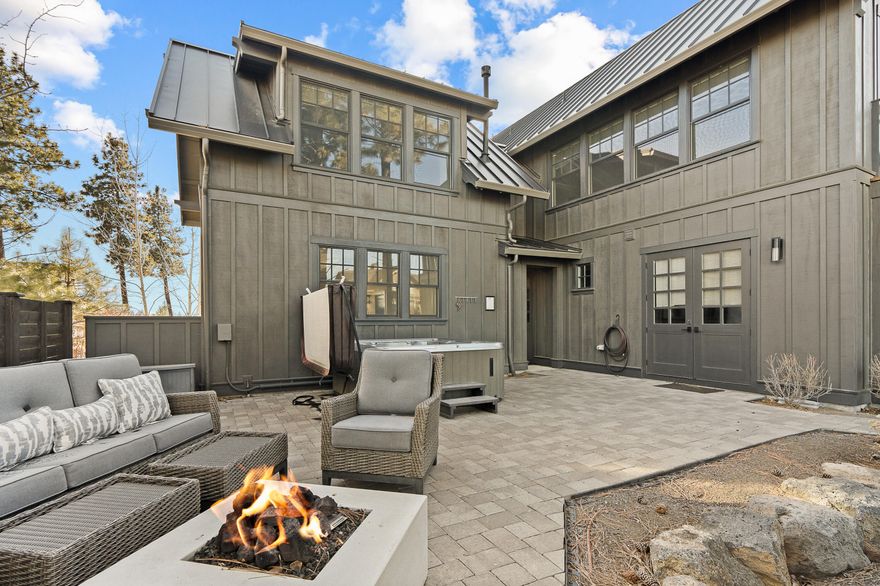 Perfectly blending luxury, convenience, and income potential, this Cairn Vacation Home at Tetherow is the ultimate base camp. Millhouse 5 is a turnkey, fully furnished 2,851 sq. ft. home with 5 bedrooms, a reverse living floor plan, fire pit, hot tub, fine finishes, an EV charger, and mountain views. This rare short-term vacation rental opportunity on Bend's west side is steps from Tetherow's award-winning amenities, including a pool, restaurants, gym, event pavilion, and world-class golf. From biking Phil's Trail to exploring Deschutes National Forest, adventure starts at your doorstep.