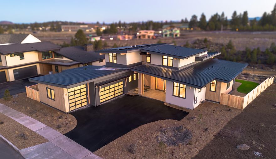 Introducing an exquisite new luxury listing in Discovery West by COBA Award-winning builder Curtis Homes. Boasting 4331 sqft of thoughtfully designed living space, this modern home features an open floor plan perfect for entertaining, an inviting island kitchen complete with custom cabinets, stylish Dekton countertops, a complete appliance package including Sub-Zero and Wolf appliances including two wine fridges, soft close drawers, and a large walk-in pantry. The spacious primary bedroom is located on the 1st floor along with another separate ensuite bedroom downstairs. There is an office downstairs, and a bonus room upstairs perfect for gaming or movie nights. There is another ensuite bedroom upstairs and a 4th bedroom and 4th full bath. Also a spacious 3 car garage with a 11' Sprinter bay. All built on a 1/3 acre lot, this gorgeous new solar-powered Curtis Home, featuring a Tesla Gen-3 power wall, will be constructed to meet Earth Advantage energy efficiency standards.