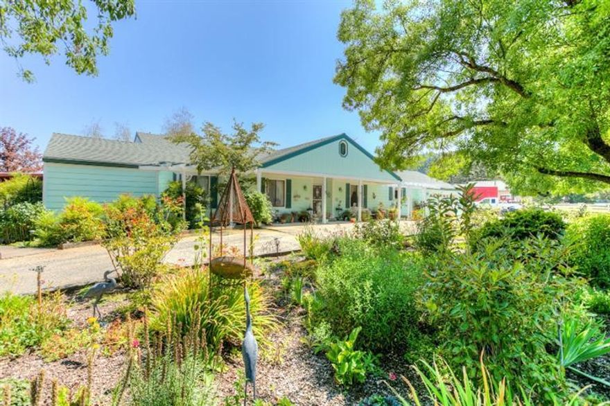 Beautiful rural property just minutes to Medford, and Jacksonville it features 5 acres of irrigation provided by TID . Over 4300 sq. ft of living space between 2 separate homes. 2-2 car garages. Property is like your own personal 5+ acre park. Nothing out of place. Pastures for horses or livestock. A large barn with 32 indoor kennels that could be used for most anything. A large inground pool and pool house with kitchenette and bathroom. Lots of covered patios to enjoy the afternoons.Well at 23 gpmLots of grape arbors, fruit trees, flower beds, deck with gazebo, garden beds, chicken house and play house. Perfect for the gentleman farmer. Grass is cut once a year and baled. By appt only.