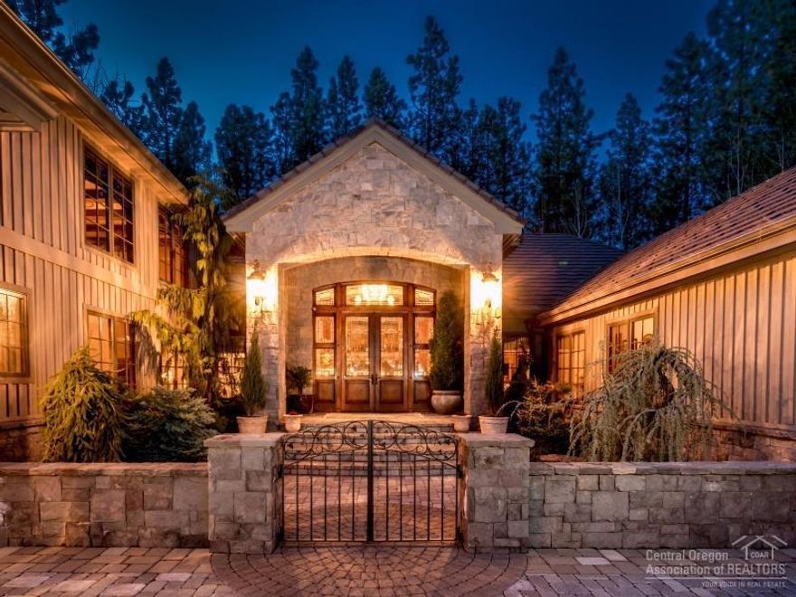 Imagine living in one of the most spectacular properties in Broken Top! The European influenced architecture is stunning from the moment you enter the grand entrance to the warm & inviting living room. Gourmet kitchen, exquisite master suite, private guest wing, dedicated theatre room & dream spaces for entertaining. Outdoor living boasts over 2,500sf of patios, water features, outdoor kitchen & spectacular light fixture over the firepit, all overlooking the 12th fairway. Close to both downtown & the trails