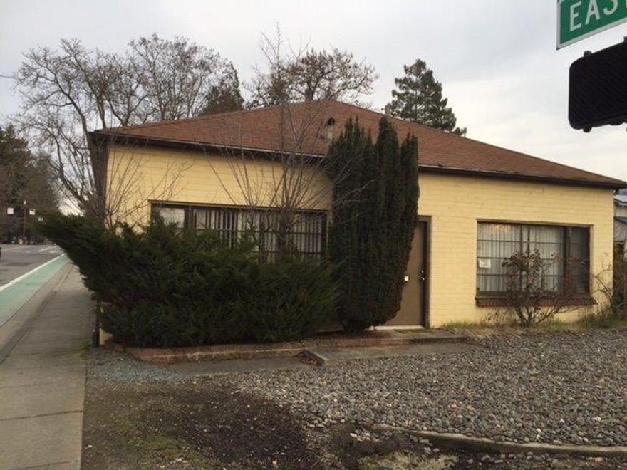 Location, Location, Location! This commercial property is on the corner of E. Park and 6th St. / Rogue River Hwy. If you are looking for high exposure this is the one for you. Sturdy 1050 sq. ft. block building with four rooms and 2 bathrooms is on .12 acres with parking. AS-IS!