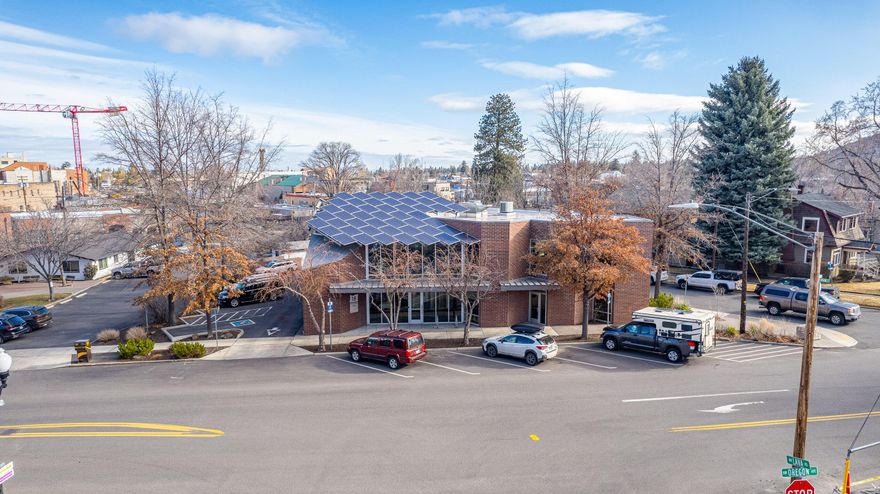Owner-user or investment opportunity. Large office building with a mix of open office space and private offices. First floor is leased to Pelican Bay Forest Products and Suite 200 totaling 4,163 is available for occupancy. Excellent downtown location across from the Bend Visitor Center and downtown parking garage.