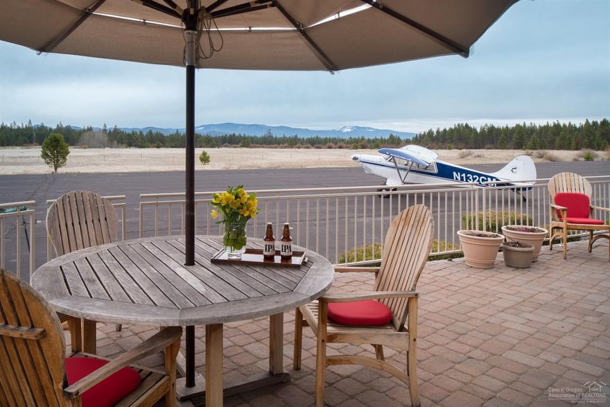 A one of a kind Custom Sun Forest Construction Hangar Home in Sunriver! Fly your plane in & park in your own private hangar. The 3,170 sq. ft. hangar/garage combined will house your RV, boat, cars, plane, shop area & more! Gourmet kitchen w/ master on the main & upstairs find 3 add'l guest bedrooms, office area + FR & Bonus Room. Oversized laundry room w/ storage. Expansive deck for enjoying the outdoors & the meadow, golf & Paulina Peak views. Deschutes River access & bike path down the street. SHARC paid!