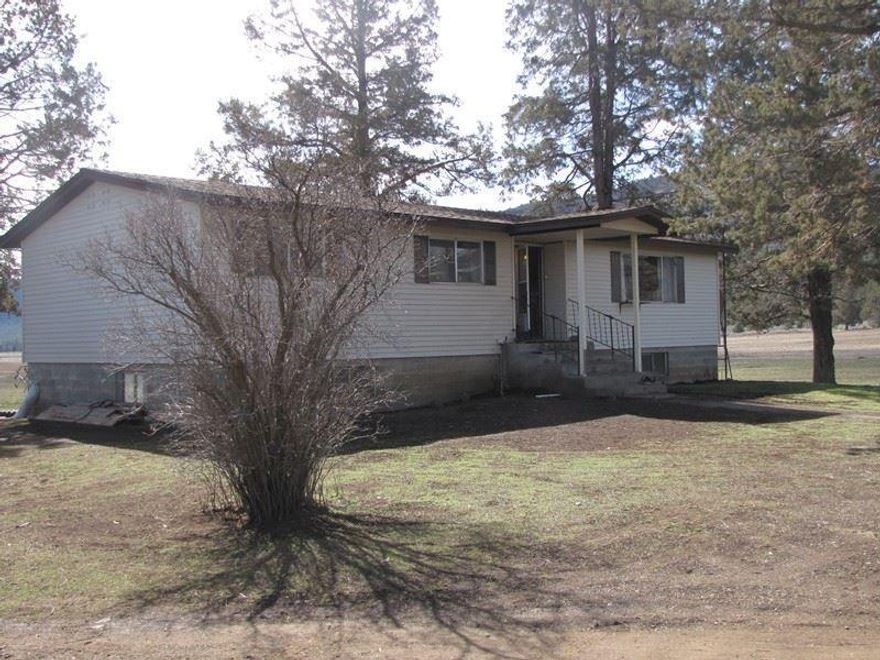 This picturesque productive 136+ acre Oregon grain ranch with class II & IV soils to insure top production also features an appealing three bedroom 2 bath home with full basement for a total of 2547 SF. There is a newer deck and vinyl siding and can be heated with wood and/or electric forced air and fuel oil monitor heat. The home is set on a tree covered knoll a short distance from a paved road which affords a nice view of the property and surrounding hills. Plenty of room here for horses, livestock and big garden area. The property is home to a herd of antelope that returns every spring to raise their young. Area of good hunting. Approximately 3 miles out of Bonanza and a 20 minute drive to Klamath Falls.