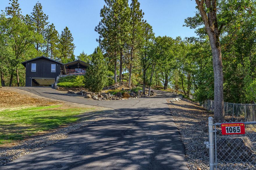 This beautiful home is a one-of-a-kind property for sure. You are going to fall in love with the architecture. The decking is a wow, could entertain over a hundred guests. Has views of the trees and mountains, next to the golf course yet privately tucked up on a knoll. The nine-car garage is going to make an excellent opportunity for the right buyer. The fireplace is wood-burning and is stunning. The kitchen has a huge breakfast bar and island, plus a large pantry and granite counter. The landscaping and gardens are beautiful and very private. Additional features: In-ground pool and Pergola. Separate space that includes a sauna and brand new hot tub with private shower. The basement is finish and could be a possible fourth guest bedroom or flex space for any needs. The list keeps going on, so make your way over to look at this amazing property.