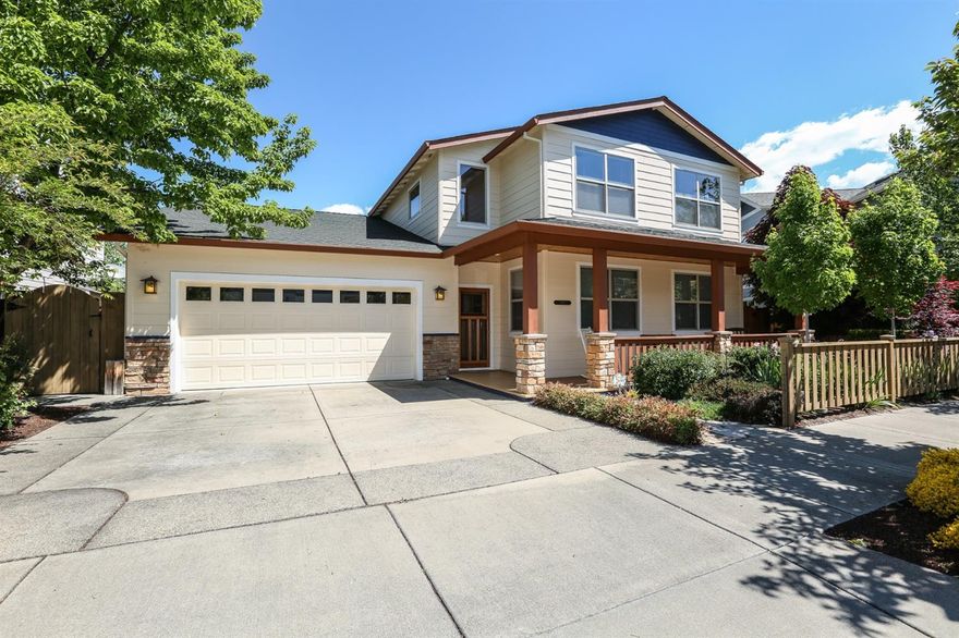 Better than new! Quality in every detail of this custom built lightly lived in home. With solid maple cabinets & floors to tasteful travertine, granite, stone and warm wood detailing, this home exudes quality and craftsmanship. No expense spared. Features include: 2 gas fireplaces (living & family rooms), central vac, custom shades, Kohler fixtures & LED lighting. Cook's kitchen has gorgeous granite counters, generous cupboard space, stainless appliances including built in MW and double ovens, huge pantry & laundry room. Spacious main level master with separate jetted soaking tub & shower, a large walk in closet with access to the covered deck & patio. Custom landscaping w/ gorgeous flowing fountain & huge patio dining area. Upstairs offers two spacious bedrooms &a double office or 4th bedroom, offering spectacular views of Grizzly & Cascades. Upstairs guest bath with separate tub & shower. Plus a private community garden in Ashland's beautiful, friendly Clay Creek Gardens neighborhood