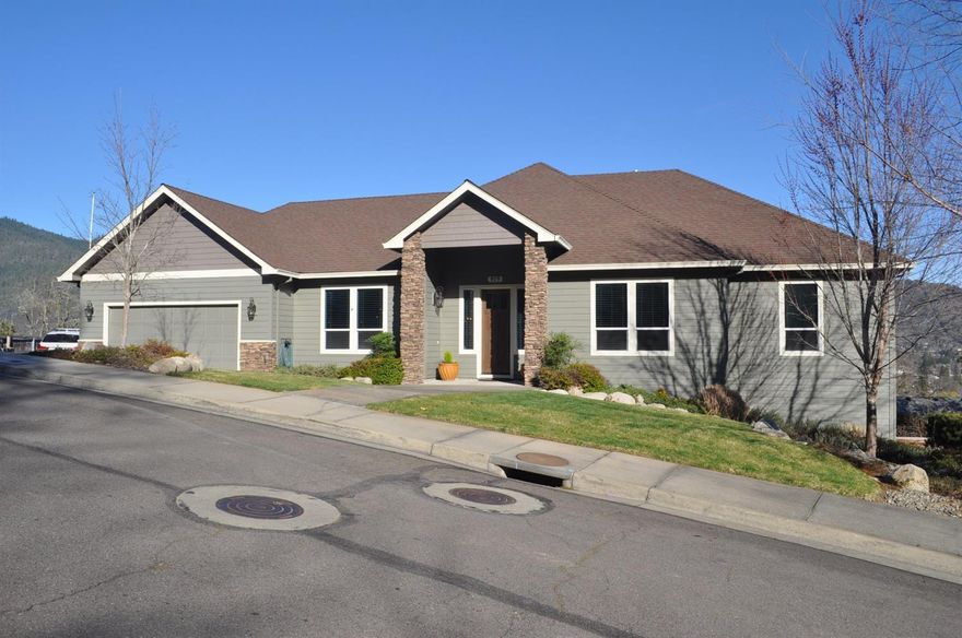 Everything you have been looking for is in this absolutely gorgeous home located in NW Grants Pass! This great family home that is also perfect for entertaining with lots of gathering space inside and out. Step inside and enjoy this generous floor plan that offers a beautiful and bright living room complete with floor to ceiling windows to bring in the views and tons of natural light, a cozy gas fireplace and access to the beautiful upper deck. The living room leads to a well appointed kitchen complete with stainless appliances, granite counters, a large walk-in pantry and a nook area that is perfect for your gatherings. Huge master suite is on the main level will not disappoint. Downstairs offers a large family room, full bathroom, a new media room complete with wet bar and 2 more large bedrooms. Large upper deck offers two gathering places and ample room to take in beautiful views of surrounding mountains and the city below. Don't miss the large RV Parking and so much more!