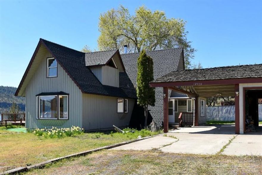 Lake House! Here's the lake house you have been looking for. Amazing views on the Ochoco Reservoir and close to the boat dock and fishing. The lake views are throughout most of the house with large windows to take in the views and the property. Upstairs has a huge master bedroom, sitting room, balcony, and bath with a jetted tub and walk-in closet. Kitchen has beautiful Spanish tile. Detached 730 sq. ft. garage/shop. New 30 year roof.