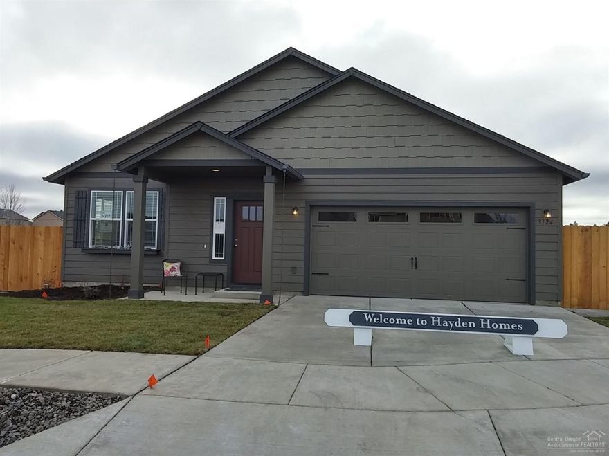 Single level Hudson floorplan. Pettigrew Place is close to Costco and St. Charles Hospital. Open kitchen with counter space galore and brkfst. bar. Pictures are of similar home. Upgrades include: covered patio, fireplace, 4' garage extension, 8' tall garage door, 4 craftsman trim, wood wrapped windows in formal area, quartz kitchen counters, laminate kitchen/dining floors, AC, masonry accents and more. Estimated completion: August 15, 2016