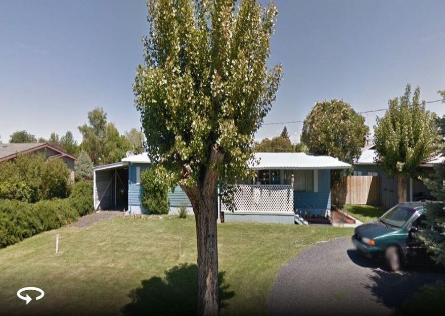 Just on the outskirts of charming Prineville Oregon this property offers 3/4 of an acre, irrigation rights, multiple out buildings and a 1966 double wide. Loads of potential here and possible owner financing too!