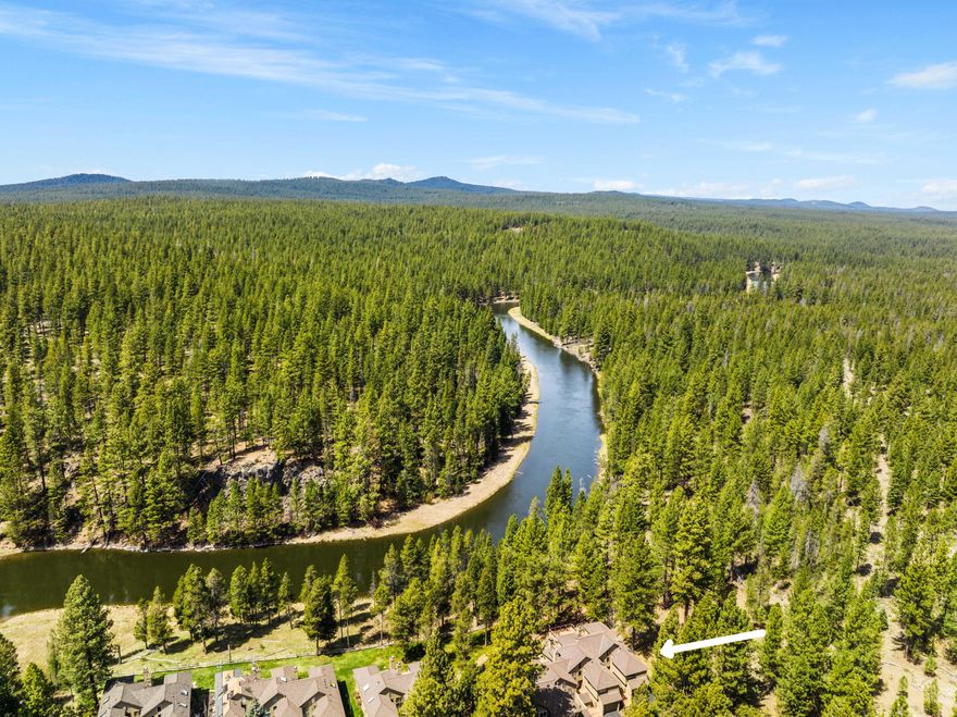 Immerse yourself in the stunning, panoramic views of the Deschutes River from this serene riverfront condo. Sitting as the most northwest property in Sunriver, this condo boasts unparallel peace and tranquility. The main level includes a cozy great room that lets in plenty of natural light, a dining area, and updated kitchen. Upstairs you will find the primary suite, along with 2 additional bedrooms and loft. Other features include a private community pool and 1 car garage for your toys. Short term rentals are not allowed in River Village. This property is an end unit situated directly next to the Deschutes National Forest. Sold Furnished.