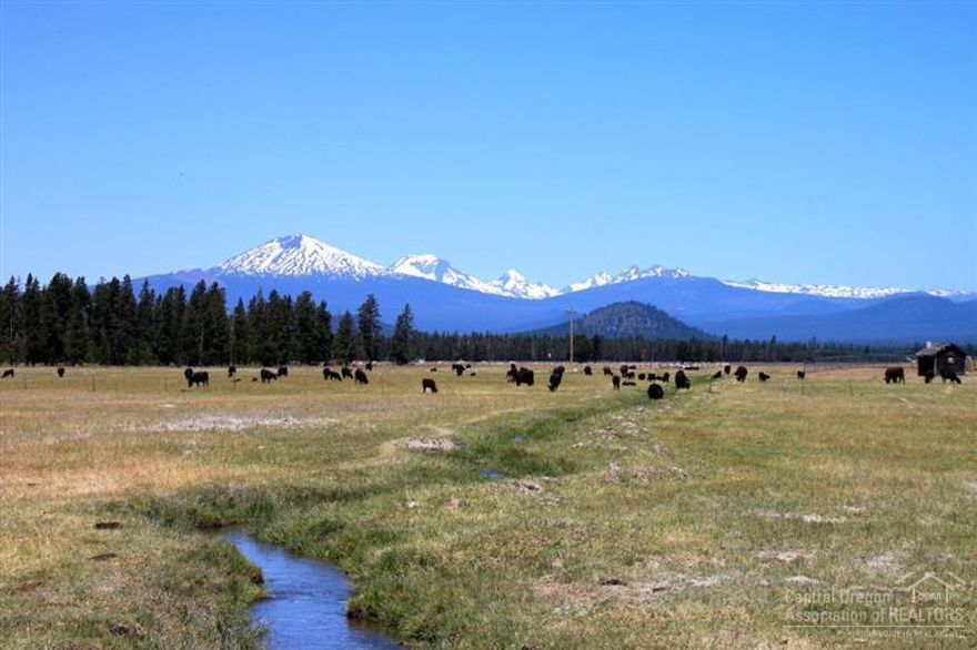 Scenic 1,099ac working cattle ranch 25 miles south of Bend, Oregon with panoramic Cascade Mountains, Paulina Peak and Paulina Prairie views. Paulina Creek flows through property supplying approx 411ac of high value direct creek diversion irrigation water rights and 3,780ac-ft of storage in Paulina Lake . 11 tax lots for future development. Pastures currently leased for cattle grazing. Endless value added development, habitat conservation, renewable energy, water resource and recreation opportunities.