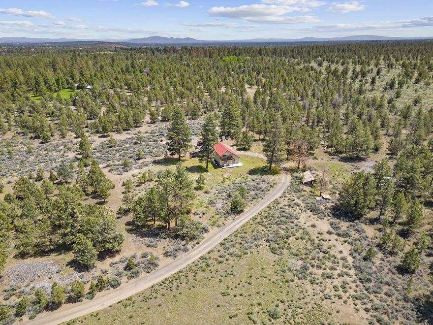 Rare, Incredible Opportunity for a one of a kind location in Tumalo! Fantastic unobstructed Cascade Views! Secluded, Private 17+ Acres across from Tumalo Reservoir with 6 acres of irrigation. Home is set back and up off the super quiet dead end road and no one can build in front of that view. Ride your horse directly from the property to public lands and trails. Perfect opportunity to build your dream home! Current home has two bedrooms, two bathrooms, beautiful views from the kitchen, living room, and upper deck and gets amazing solar during the day. No light pollution here so you can also enjoy the stars at night. Just 10 minutes to downtown Tumalo and the Tumalo Elementary School. Beautiful area for mountain/road biking/hiking directly from home. This is truly a special opportunity!