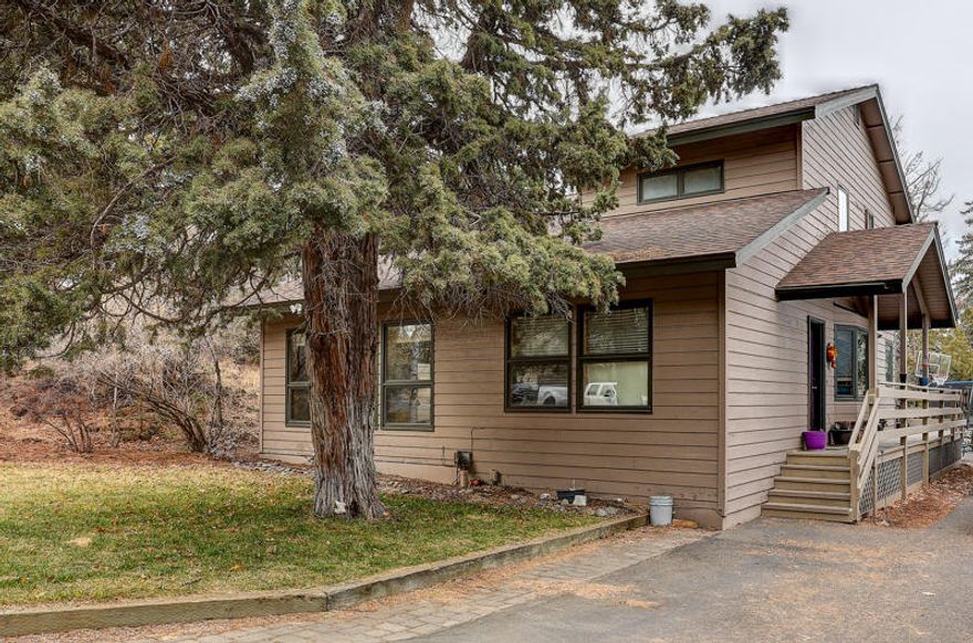 Excellent investment rental home ($2,100 per month) or full-time residence.  You will love this hard to find classic 4 bed 2 bath 2372 sq ft home in a quiet peaceful neighborhood with RV/Boat parking.  This solid built well insulated home has great bones with unlimited potential.  The home features the Master on the main with 3 beds and 1 bath up, Generous laundry/pantry area (150sq. ft.) with a utility sink, Covered front trex deck, Private separate (109sq.ft.) office off the entrance, Sunken Livingroom, Great kitchen storage, 2 car garage with great above storage and 3 metal workbenches/1 wooden work bench and Low-Maintenance Landscaping with front yard lawn and sprinklers.  Close & Conveniently located to Hwy 97, North downtown, Orchard park, Canal row park and Hollingshead Park.  Call your favorite realtor today to schedule your private showing.