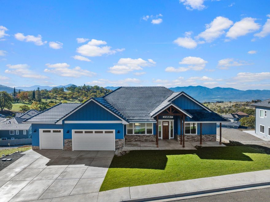 Gorgeous modern residence available in the highly sought-after Saddle Ridge community. This upscale dwelling showcases an extravagant, folding glass wall feature, providing uninterrupted entry to the extensive covered porch and awe-inspiring views of the valley. The residence offers an expansive kitchen and casual dining space, a generously proportioned pantry adjacent to a spacious kitchenette, premium quartz countertops, dual primary suites on both the upper and lower floors, and exceptionally spacious closets. The flowing layout includes expansive common areas for living, dining, and family activities, all illuminated by ample natural light. Additional highlights comprise a convenient mudroom, a capacious three-car garage, and laundry facilities on both levels. The home is adorned with exquisite features and meticulous finishes, including artisanal tile craftsmanship. Anticipated completion prior to the closing date.