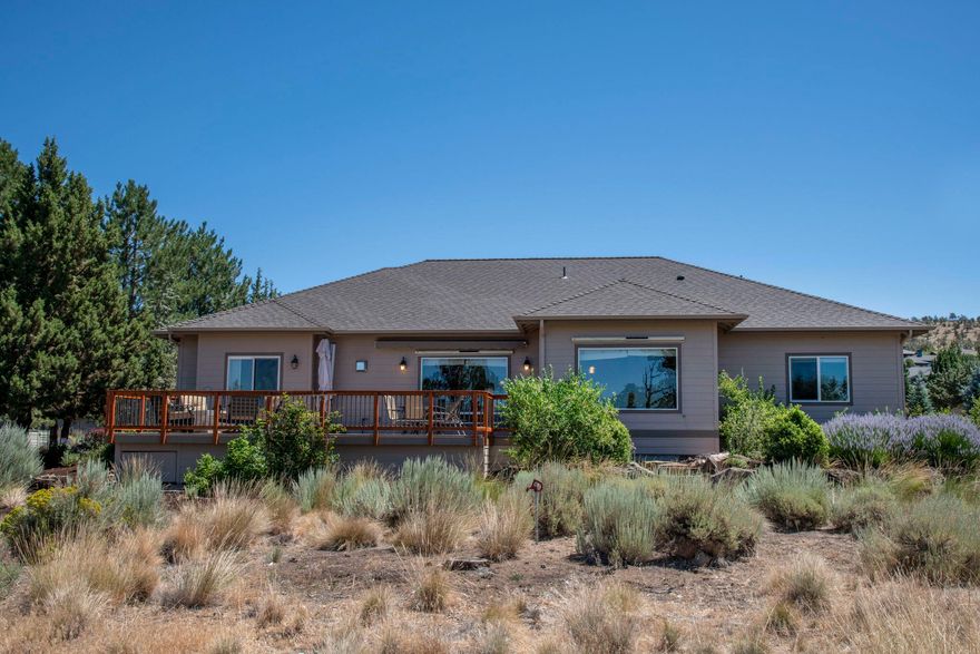 Location! Location!  This one level home backs to BLM with views of the Cascade Mountains.  Featuring open floor plan, office, new oak engineered floors, Tile countertops and an Energy Efficient heating and cooling system. The oversized garage is a great addition for extra workspace.  The newly built expansive deck with built in fire pit overlooks the mountains with tons of privacy. Enjoy Eagle Crest amenities.