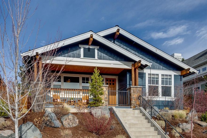 Adorable single level Northwest Crossing home crafted by artisans at Leader Builders. Perched on a high lot just blocks from shops, restaurants, parks and more, this exceptional home features a well-designed floorplan, warm hardwoods throughout the great room, kitchen, and master bedroom, Beautiful built-ins, elegant coffered ceilings, and custom cabinetry. The elevated South-facing lot offers excellent privacy, an abundance of natural light, and views of Mt Bachelor from the covered porch. Stunning private backyard oasis awaits with a hot tub, covered patio, charming xeriscaped landscaping and views of the Sister's and Broken Top. A thoughtful home packed with all the details desired by today's homeowner including an additional bump out in the garage for bike/gear storage.