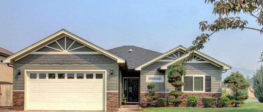 Inclusions: Range/Oven, DW, MW, ceiling fan, garage door opener. Seriously Move in Ready! Shows like a new home! This gem is located in the highly sought after Stonegate Estates..it is single level on a corner lot with a well designed split floor plan and a bonus room for hobby/den/office! Living room is open w/gas fireplace. Close proximity to shopping, medical, wineries, restaurants, award winning public golf course and services! Features include: high ceilings throughout, upgraded plank style laminate flooring, newer light and bright kitchen remodel, newer stainless appliances, custom white cabinets and granite countertops w/ custom subway tile back splash and double sinks in both baths! Enjoy gorgeous evenings in the backyard with beautiful views of Roxy Ann and the surrounding hills. Motivated Seller!