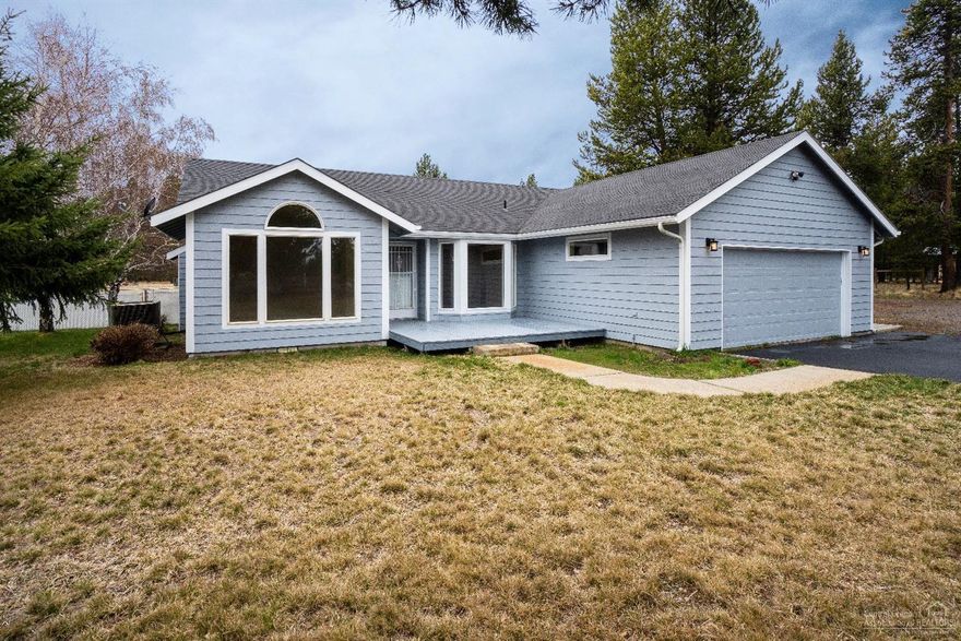 Beautiful clean open concept home with gas fireplace in family room. Large lot 2.37 acres with back porch and separate large shop. Master has its own bathroom and walk in closet. Formal front room. Lots of storage in kitchen and laundry room. Completely newly painted interior. Newer roof too. Double car garage has workbench and built in shelving. The land out back has space for horses and RV's, toys, etc. Front yard has sprinkler system. Unpack and settle right in, this house is move in ready now.