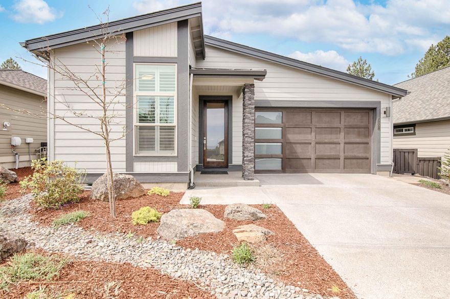 Perfectly placed LIKE NEW HOME in River's Edge. This home offers an open floor plan perfect for family entertainment. Not a detail was missed with skylights in the living area and under the counter windows in the kitchen give this home a light and bright feel. Large plank wood floors in the living space and 3rd bedroom. Kitchen features upgraded countertops with stainless steel appliances and a large island for gatherings. Spacious Master Suite with walk in closet and access to relaxing back patio for those winter and summer evenings. This home offers it all from high end finishes to low utilities!