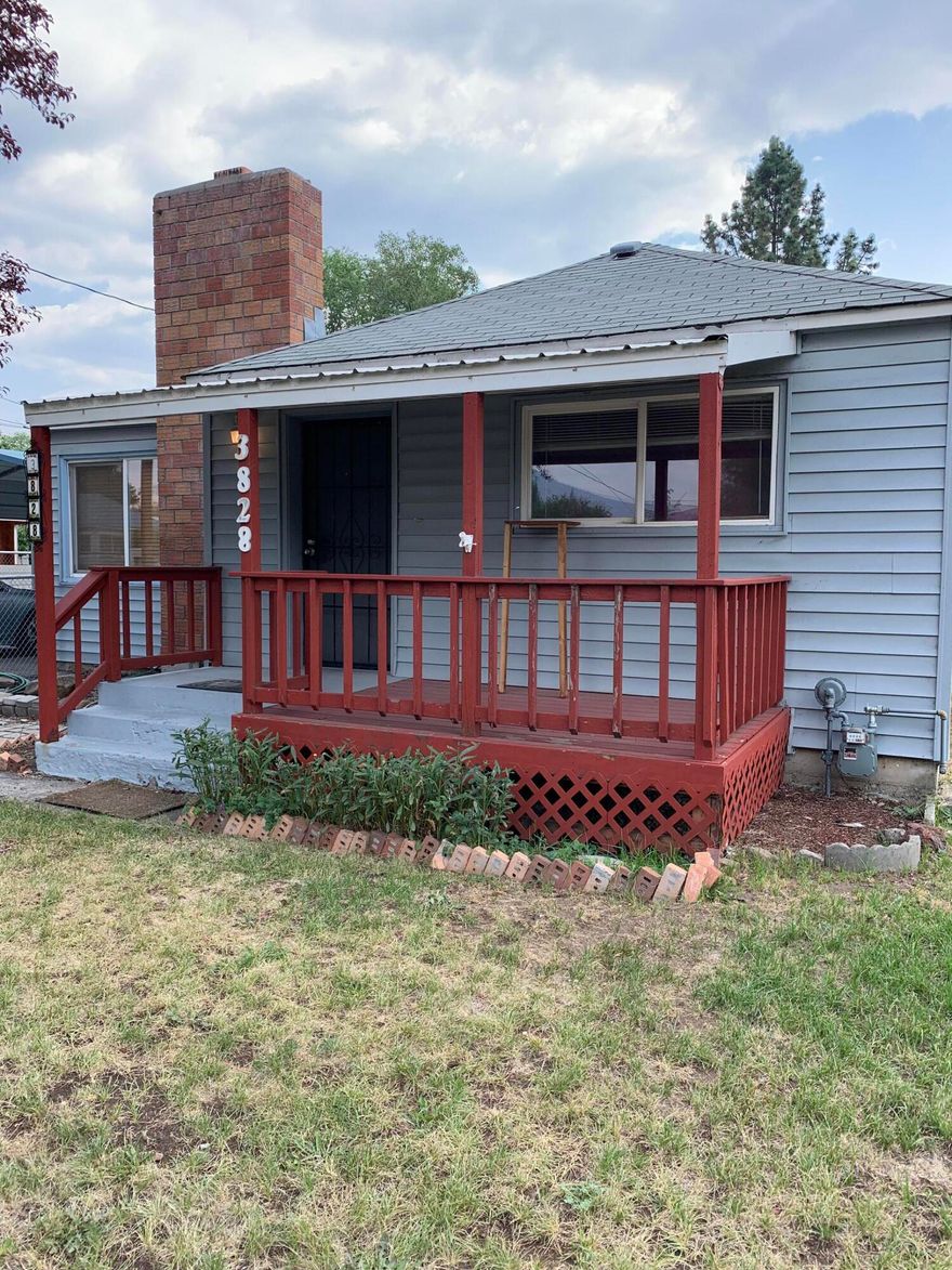 Single level home on .49/acre in suburbs.  Fenced back yard with newer pump to KID irrigation ditch.  Cottage style home with covered front porch.  3rd bedroom is an addition with adjoining room built for hot tub, but hot tub was removed.  4 separate storage areas.  Carport.  RV parking and access to back yard.  Dated interior is perfect for a DIY enthusiast or renovator.