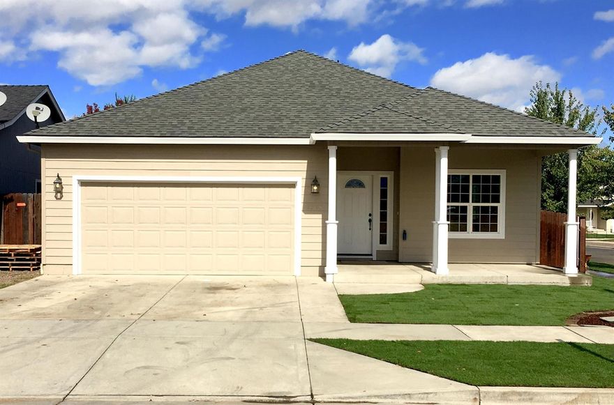 This home is better than new. Completely remodeled, everything is new! There are 9' ceilings throughout the home. The beautiful open kitchen has granite counter tops and there is even an elevated eating bar for morning breakfast or entertaining. All new stainless steel kitchen appliances including the fridge have just been installed. The living room, dining room, kitchen and hall all have brand new wood flooring, base trim throughout the entire home and carpet in the bedrooms. It has just been repainted inside and out. The bathrooms both have new cabinets, fixtures and tile flooring. The master bedroom has a coffered ceiling, ceiling fan, and large walk-in closet & access to the covered patio. The yard has new sod that was just laid as well. Come home and relax on the front porch or back patio - both are covered!