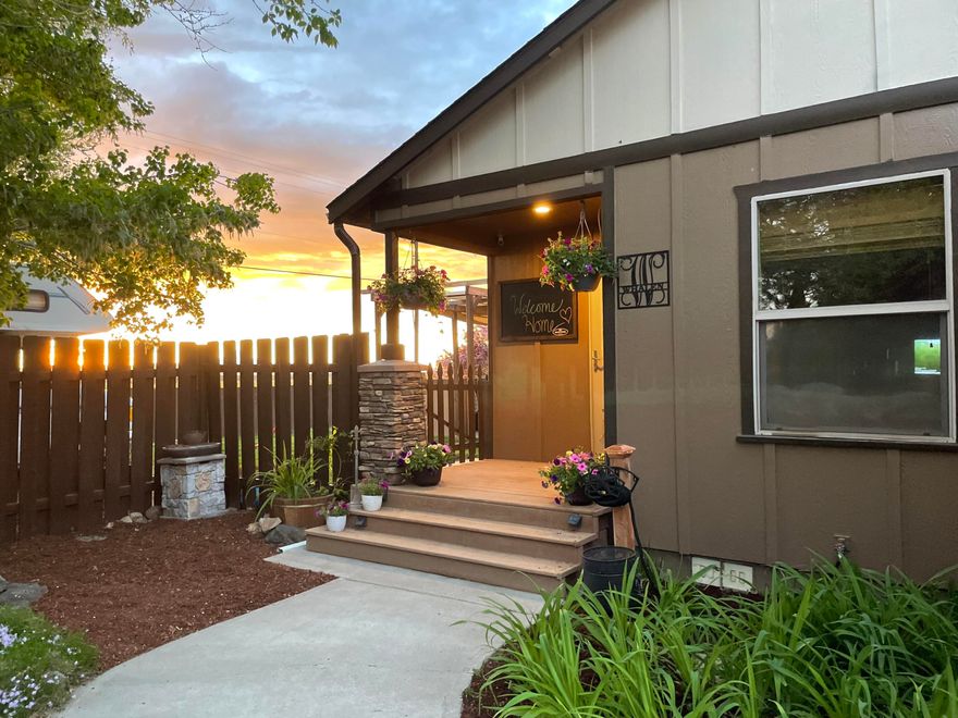 Must-see Cascade Mountain views from Bachelor to Olalie with valley below and only 7 minutes to downtown Redmond. This nicely updated single-story home has an open floor plan, vaulted ceilings, oversized kitchen, 3B 2B + 4th flex room. Laminate flooring, heat pump with AC, tile counter tops, ceiling fans in every room, pellet stove, fully fenced yard w/dog run, custom enclosure for backyard Kitchen, custom stone patio, a second level of yard that can be used for additional lawn or parking. RV parking, primary bedroom has sliding glass door and Smart fan/light. Incredible High-speed internet supports 3 work from home employees and a gamer with speeds up to 1GB. Large open floor plan makes holiday entertaining easy. Country living that is still close to grocery stores. Evening strolls in the Spring to see new baby goats, calves, lambs, horses, and chicks.  Incredible lightning shows and some of the best sunsets, year-round.