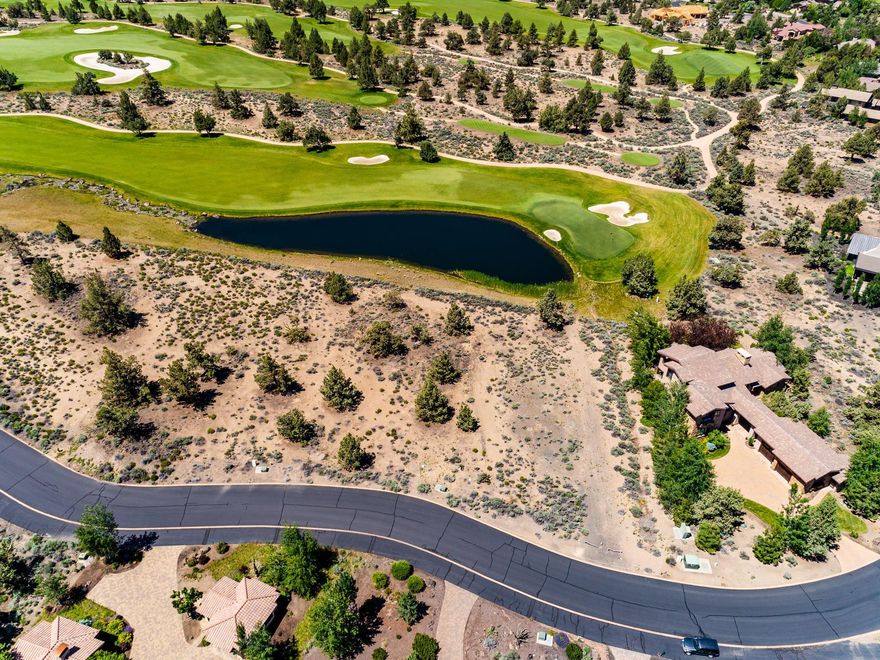 Take in amazing cascade mountain, golf and lake views from this .49 acre homesite located off the 8th green of the Jack Nicklaus Signature Course at Pronghorn Resort. Peacefully located in the Estates at Pronghorn, this flat, buildable lot is is perfect for anyone looking to enjoy serene waterfront views of the greenside lake and big Cascade Mountain views beyond the golf course.
Named by golf magazine one of the 25 best golf resort communities in the US, enjoy easy access and close proximity to the grand 55,000-square-foot clubhouse at this beautiful high desert oasis. With 2 world class golf courses,  & all the amenities of Pronghorn resort, including 3 swimming pools, tennis court, spa, numerous dining outlets, & the Huntington Lodge - a 104 room boutique hotel. 
Price includes transfer of full $115,000 required Pronghorn Membership deposit to Buyer.
Seller Carry Financing Available.