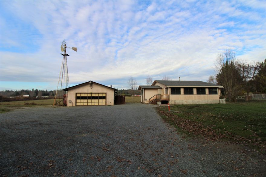 Jerome Prairie area property! This manufactured home is located on 1.12 acres with a 24x32 detached garage, pond, irrigation, 25x95 fenced garden area, huge windmill that actually pumps water when the wind blows, wood storage area, gated entry, high ceiling in the open kitchen, living room, family room, master bedroom with bath, large walk-in pantry, fully fenced - with gated entry, 2 bedrooms - with one room that has been used as a bedroom - but does not have a closet - could be an office too. Cash only,(NO owner carry), wood heat only. Sq/footage includes the 672 sq/ft single wide 1973 mobile home and a combined 384 sq/ft and a 448 sq/ft  enclosed porches. The mobile & both enclosed porches were all connected together in 1995 by roof trusses that span the whole structure together as one in.
* Multiple offers in. Highest & Best offer due by Tuesday@ 12:00. 
All information deemed accurate, but not verified. Buyer to do own investigation into the condition and uses of subject property