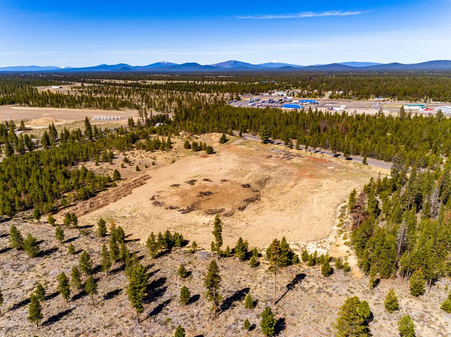 Rare opportunity! 11.9 acres+/-parcel close to Wickiup Junction 3/10 mile east of Hwy.97. Level Building Lot within the City limits of La Pine views of Paulina Mtn. Range, ideal for light industrial.Utilities are available at Rosland & Drafter Rd. Check with Midstate for Electricity. La Pine's commercial and residential growth is on the increase.  Many new homes are under construction with completed homes ready to move into.  Move your present company  and build new on this level industrial building site.