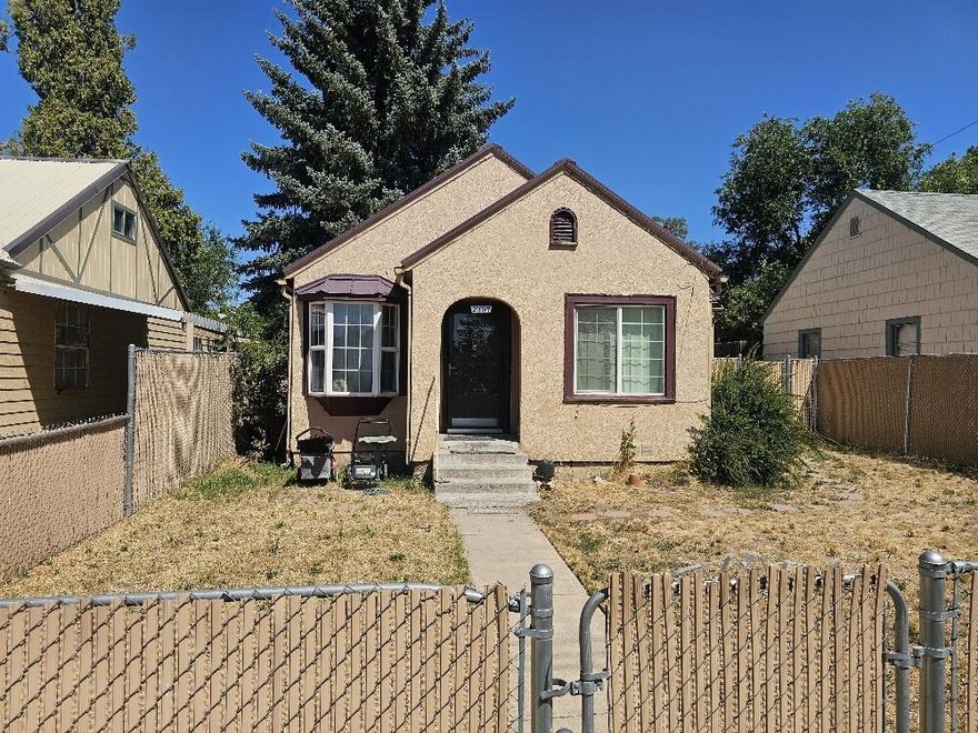 Cute little 2 bedroom 1 bath (Jack and Jill) with hardwood floors and new laminate in the kitchen. Fully fence with inground sprinklers and a detached garage/workshop in the back yard that has access from the back alley. Everything is in good shape, vinyl windows and it has a metal roof!