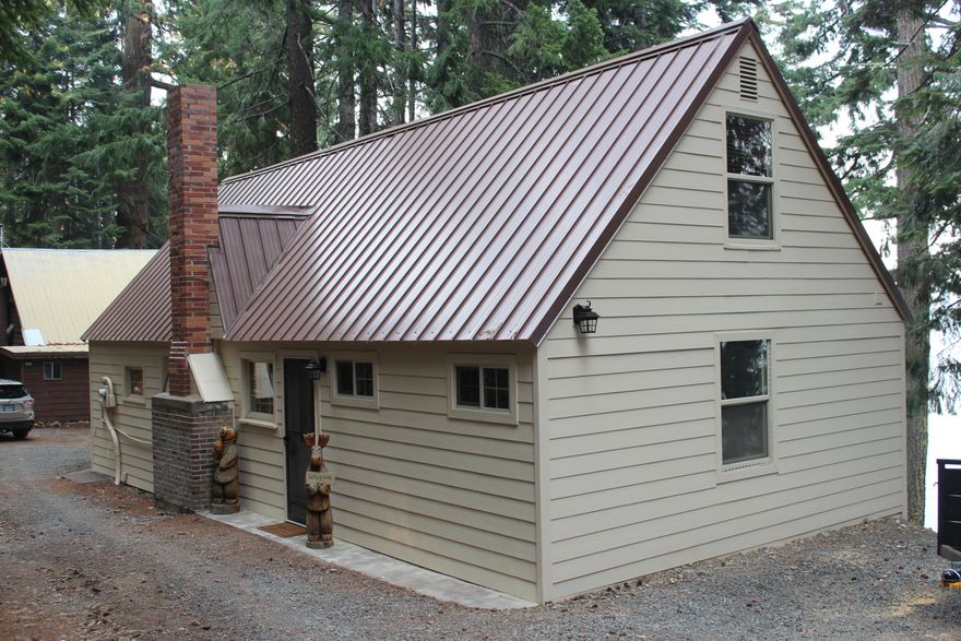 Rare West side Lake Front with spectacular lake views.  Partially finished boat house - Separate laundry building - Subject to lease currently in effect with the U.S. Forest Service