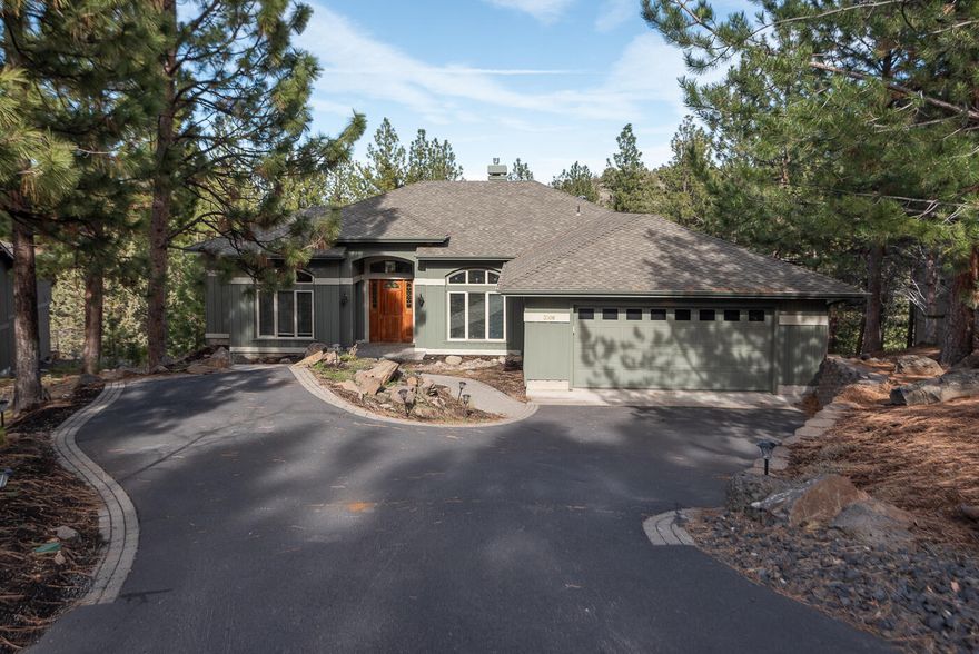 Enjoy refined living on the 12th fairway in this beautifully remodeled single-level home in Awbrey Glen. Completed in 2023, updates include a chef's kitchen with quartz countertops, wine fridge, and custom cabinetry by Brian's Cabinets, as well as wide-plank maple hardwood floors and a stone-accented gas fireplace in the great room. The primary suite offers a spa-inspired retreat with heated floors and a large walk in  closet with a cedar floor. Step onto the expansive deck to take in peaceful golf course views overlooking the 12th fairway.  With a heated, oversized garage wired for EV and generator, this home is ready for modern living.